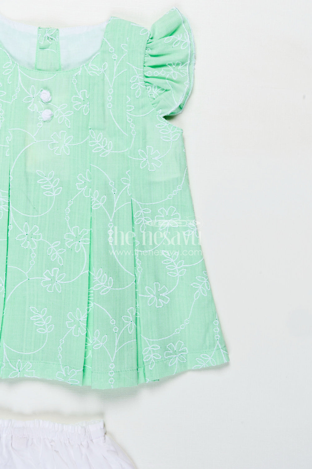 The Nesavu Baby Cotton Frocks Light Pink Frocks for Babies in Green Embroidered Cotton with Frilled Sleeves and Matching Bloomers Nesavu Nesavu Light Pink Frocks Green Cotton Thread Embroidery Ruffled Bloomers Babies