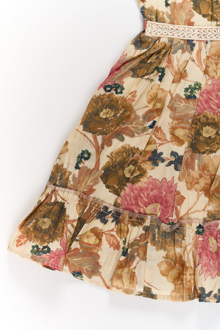 The Nesavu Girls Cotton Frock Long Cotton Frock for Girls in Beige Floral Design with Ruffle Details Nesavu Long Cotton Frock Girls Beige Floral Design Ruffled Hem | The Nesavu