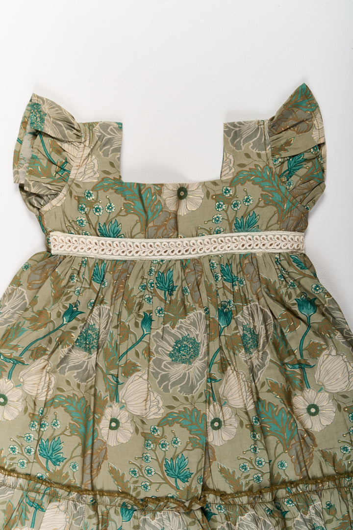 The Nesavu Girls Cotton Frock Long Frock for Girls in Green Floral Design with Lace Waist and Ruffle Hem Nesavu Long Green Floral Frock Girls Ruffle Hem Lace Waist | The Nesavu
