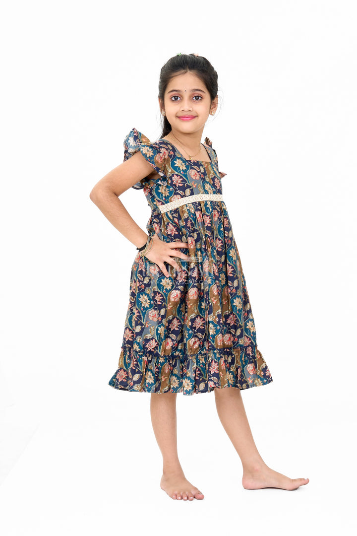 The Nesavu Girls Cotton Frock Long Party Wear Gown for Girls with Elegant Black Floral Print and Ruffle Details Nesavu Long Party Wear Gown Girls Black Floral Print Ruffles | The Nesavu