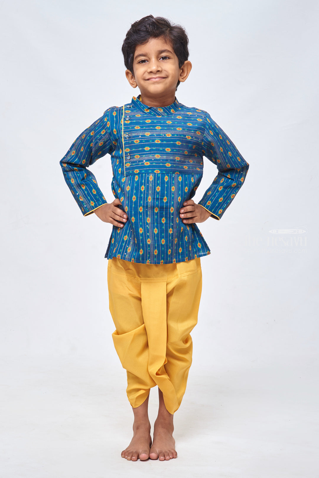 The Nesavu Boys Dothi Set Lustrous Blue Kurta: Embellished with Lurex Zari and Sequin Paired with Yellow Panchagajam Dothi Nesavu 12 (3M) / Blue / Cotton BES371A-12 Designer Boys Ethnic Outfit | Boys Ethnic Kurta and Panchagajam Set | The Nesavu