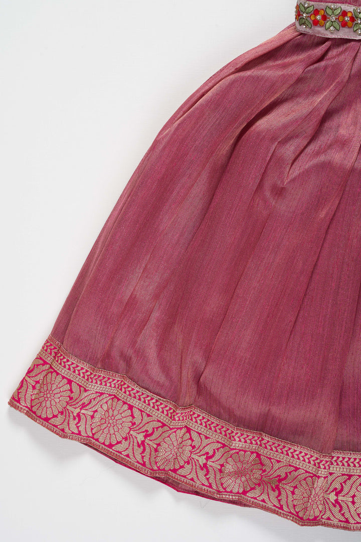 The Nesavu Girls Silk Gown Magenta Tissue Fabric Saree Gown for Girls with Embroidered Hip Belt Nesavu