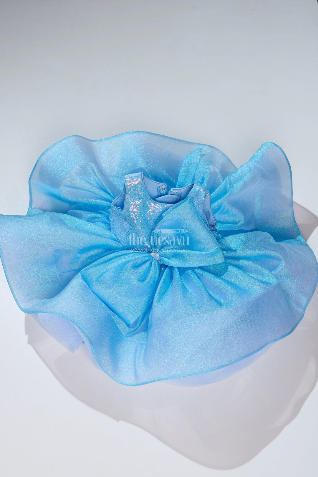 The Nesavu Girls Tutu Frock Magical Pari Frock for Girls with Shimmering Blue Net and Oversized Bow Nesavu Magical Pari Frock Girls Shimmering Blue Net Oversized Bow | The Nesavu