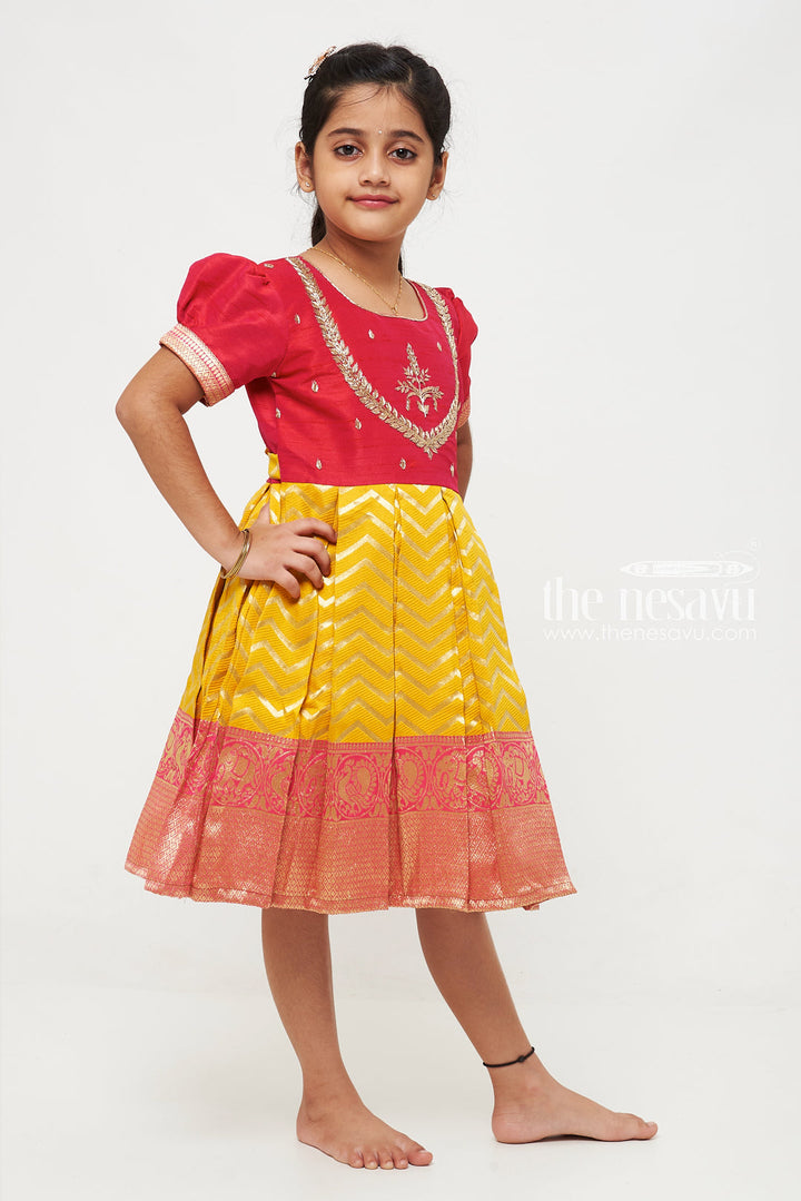 The Nesavu Silk Party Frock Majestic Maroon and Yellow Pattu Silk Frock: Intricate Gold Embroidery with Chevron for Girls Nesavu Maroon and Yellow Pattu Silk Frock | Chevron Pattern & Banarasi Border | Traditional Festive Wear for Girls | The Nesavu