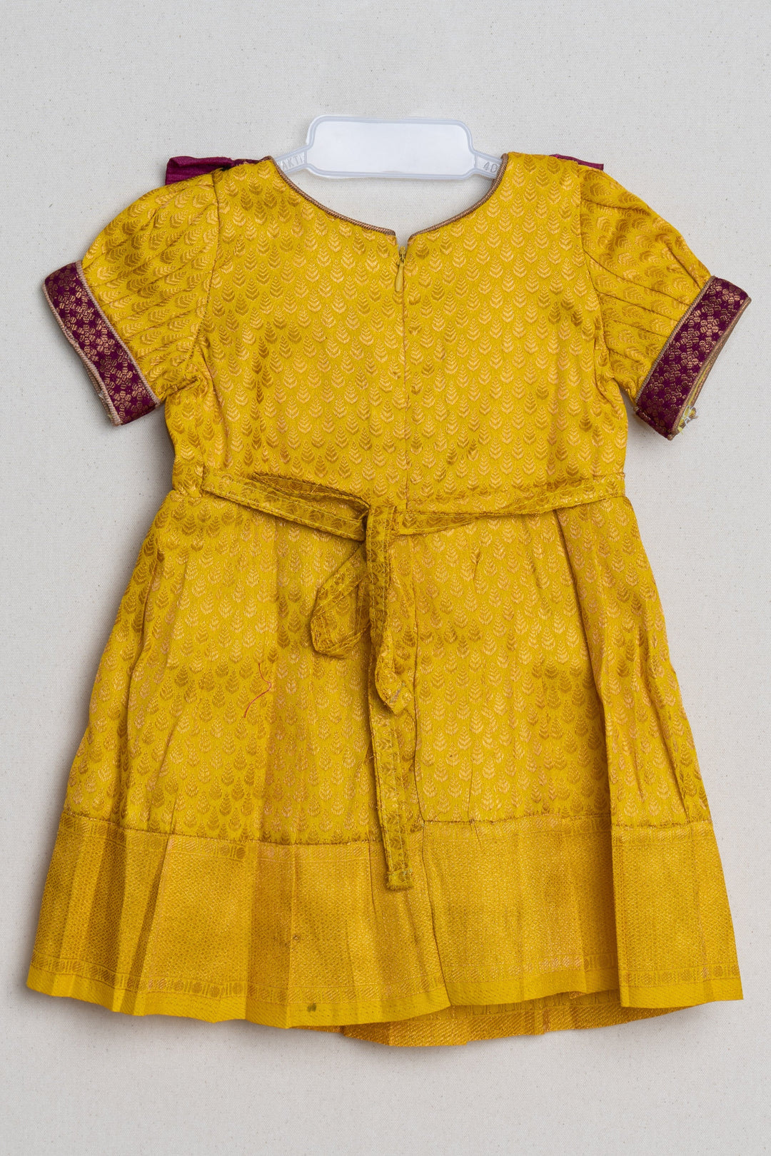 The Nesavu Girls Kanchi Silk Frock Mango Yellow with Deep Purple Semi Banarasi Silk / Pattu Frock for Kids Girls Nesavu Floral Purple and Yellow Semi-Silk Frock for Girls | The Nesavu