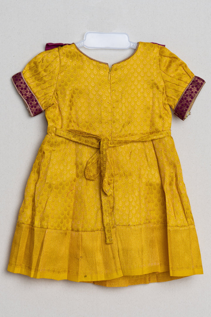 The Nesavu Girls Kanchi Silk Frock Mango Yellow with Deep Purple Semi Banarasi Silk / Pattu Frock for Kids Girls Nesavu Floral Purple and Yellow Semi-Silk Frock for Girls | The Nesavu