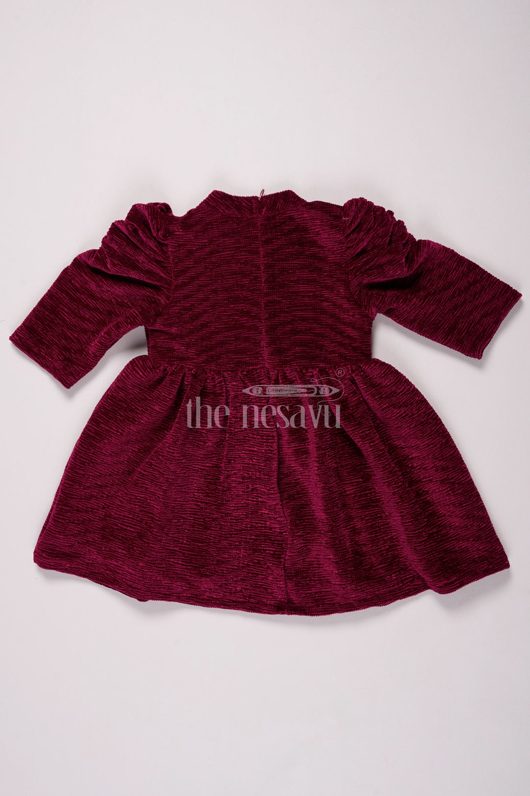 The Nesavu Baby Fancy Frock Maroon Glaze Organza Baby Fancy Frock with 3/4 Sleeves and Pleated Skirt for Girls Casual and Festive Wear Nesavu Nesavu Maroon Baby Fancy Frock Velvet Texture 34 Sleeves Girls Winter Fashion