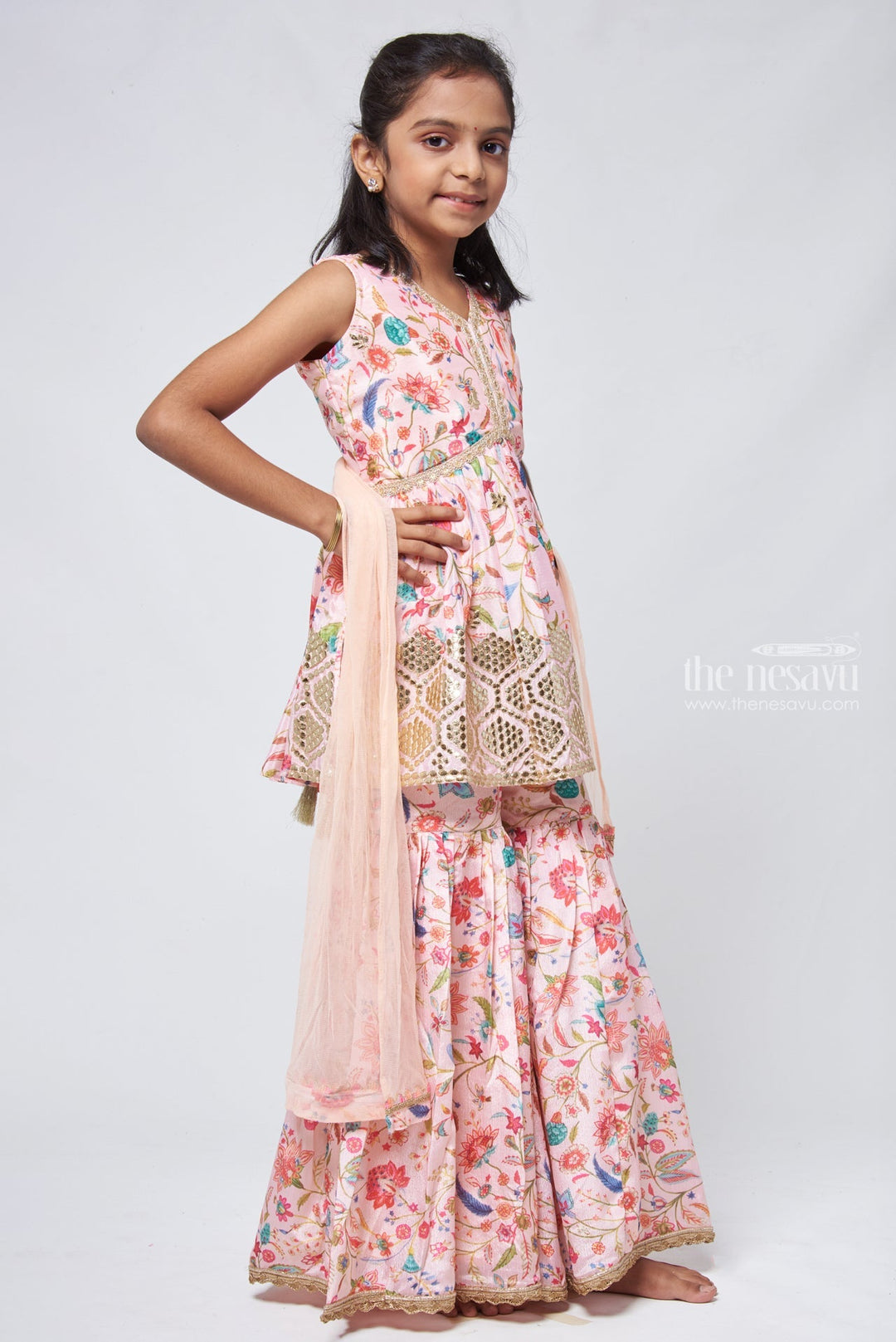 The Nesavu Girls Sharara / Plazo set Mesmeric Sequins Embroidered Salmon Peplum Kurti with Palazzo Classic Festive Ensemble Nesavu Latest Palazzo Suit for Girls | Girls Kurti and Palazzo Pant | the Nesavu