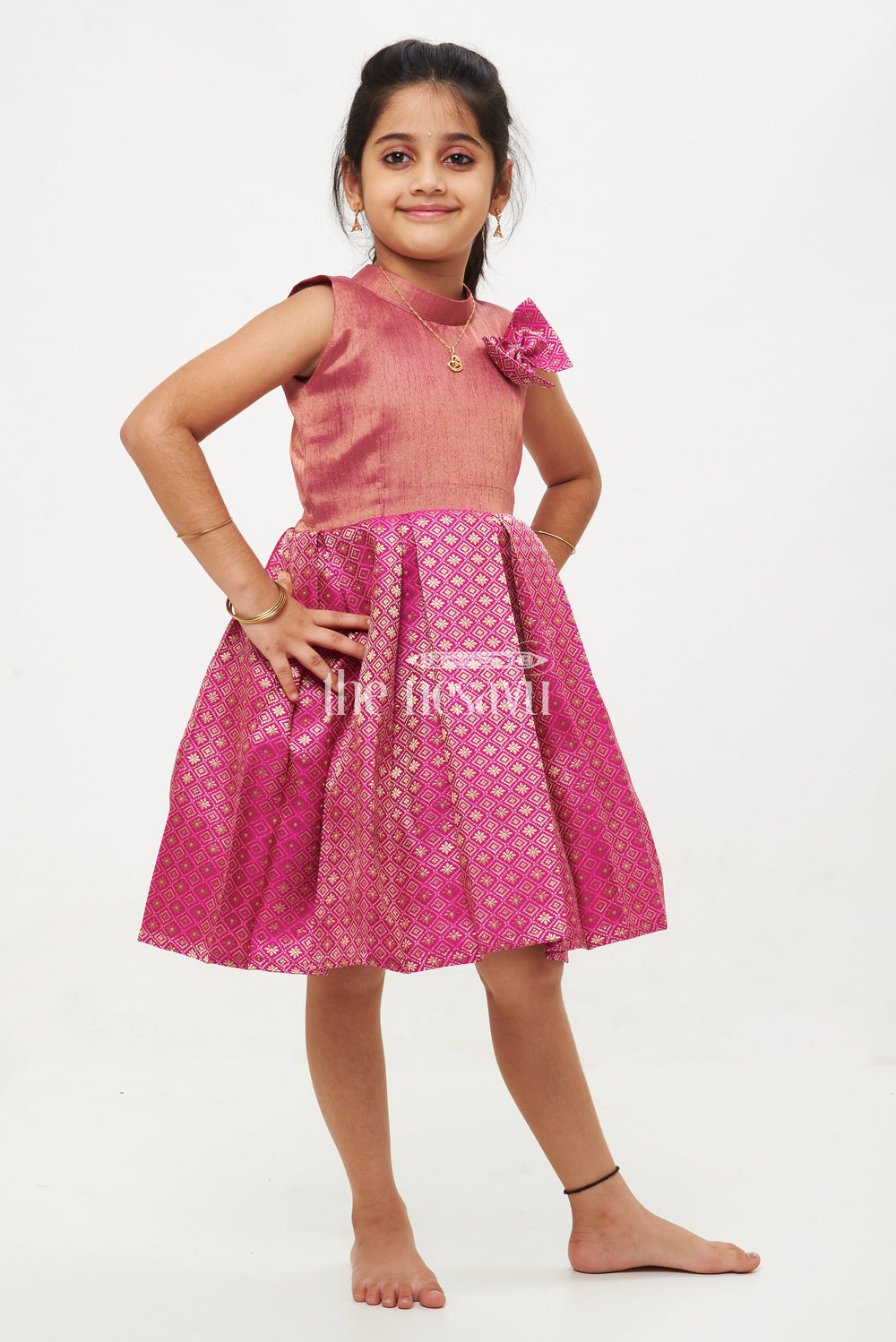 The Nesavu Silk Frock Miniature Majesty: Pattu Silk Frock in Pink and Gold for Girls Nesavu Miniature Majesty: Pattu Silk Frock in Pink and Gold for Girls - Traditional Wear