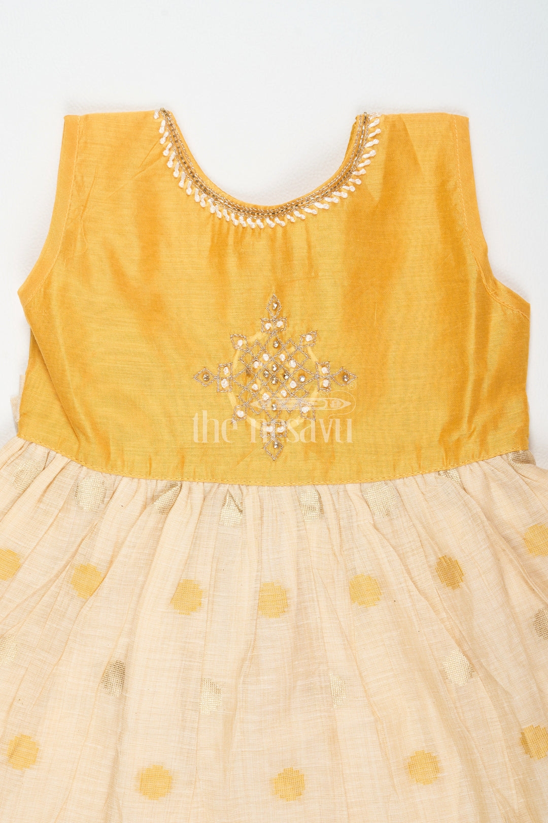 The Nesavu Girls Cotton Frock Mustard and Beige Chanderi Cotton Frock for Girls with Silver Beadwork and Polka Dot Details Nesavu Nesavu Girls Mustard Beige Chanderi Cotton Frock Silver Beadwork Polka Dot Skirt