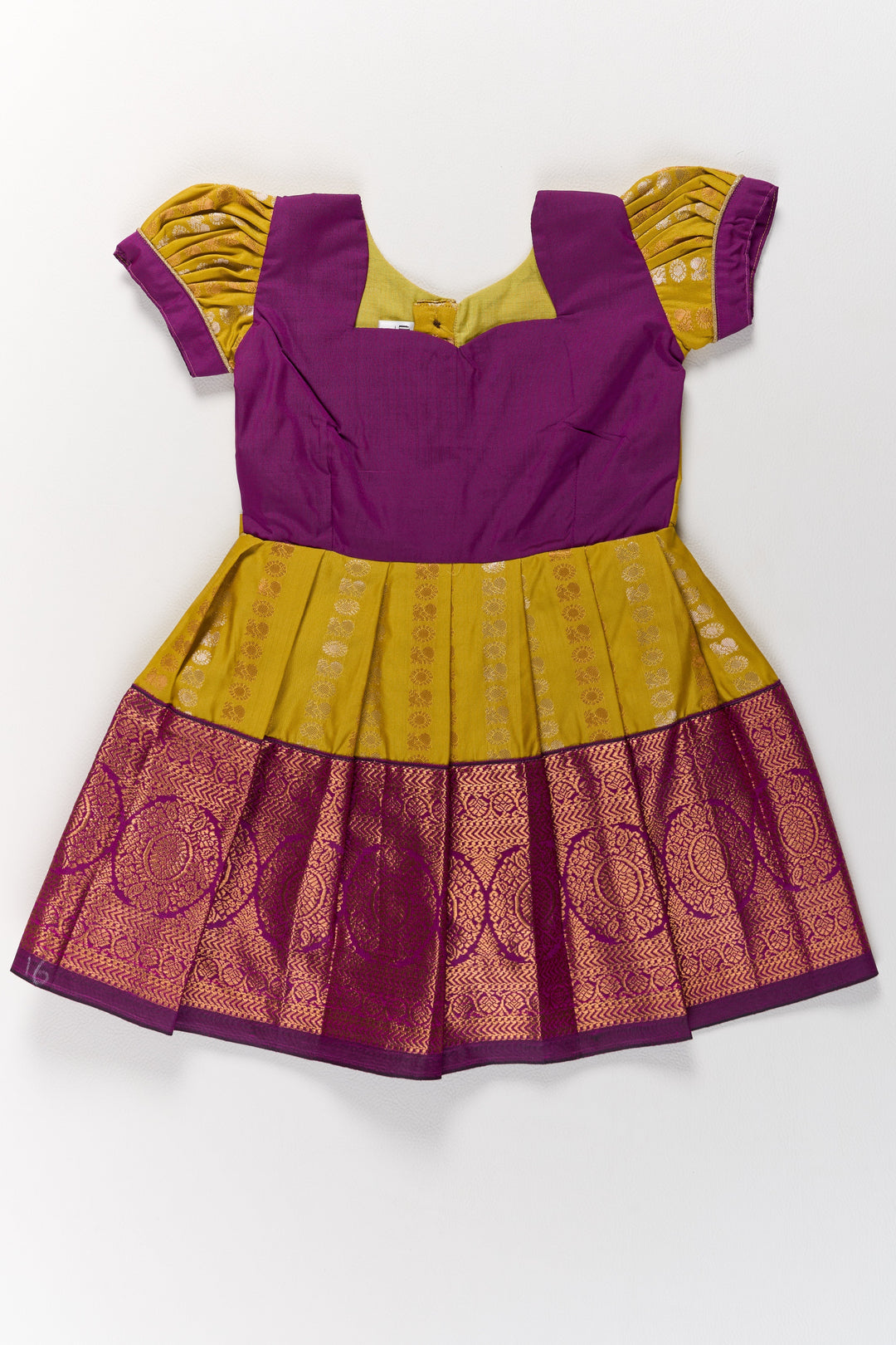 The Nesavu Girls Kanchi Silk Frock Mustard and Maroon Pattu Pavadai for Girls with Elegant Zari Motifs Nesavu Mustard Maroon Pattu Pavadai Girls Elegant Zari Motifs | The Nesavu