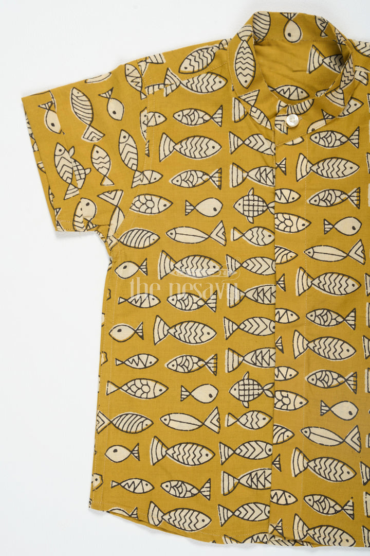 The Nesavu Boys Cotton Shirt Mustard Boys Ajarak Block Printed Cotton Shirt Half Sleeves with Fish Design Traditional Look Nesavu Mustard Ajarak Block Print Boys Cotton Shirt Nesavu Fish Design Half Sleeves Festive Wear