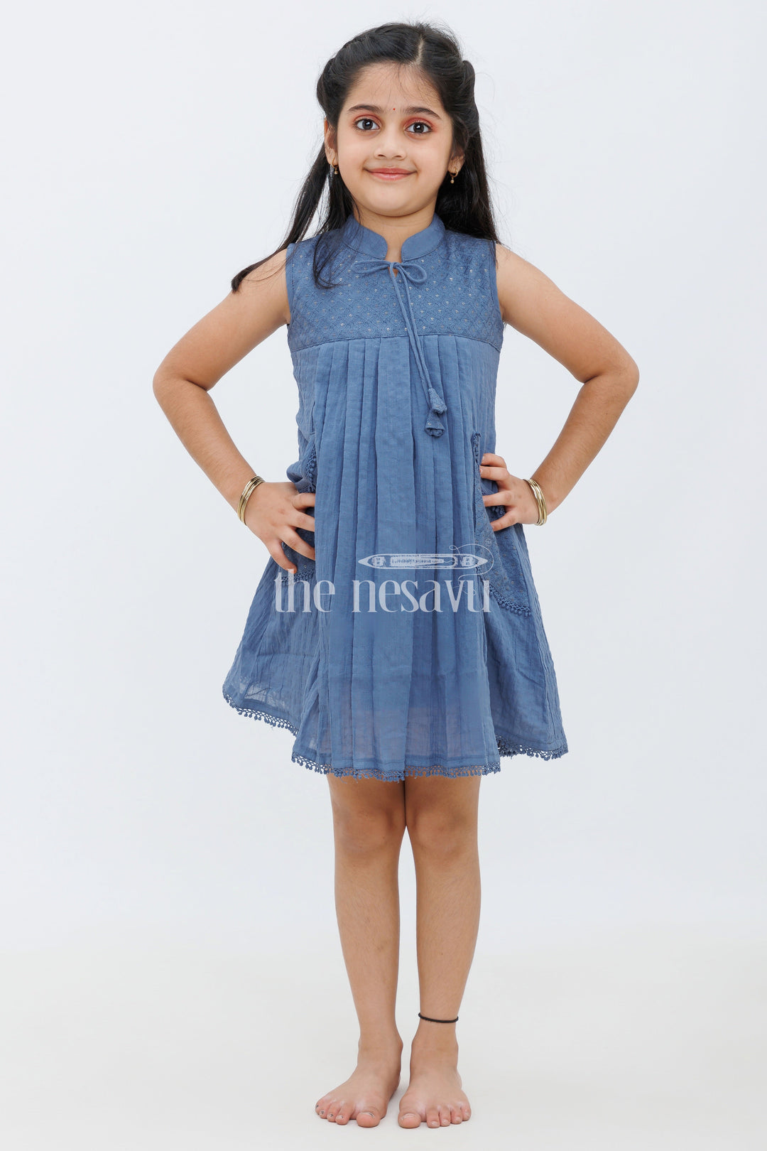 The Nesavu Girls Cotton Frock Mustard Cotton Frock with Center Box Pleats and Embroidered Yoke Line for Girls Nesavu Blue Cotton Frock with Embroidered Yoke Line and Pleats for Girls Nesavu