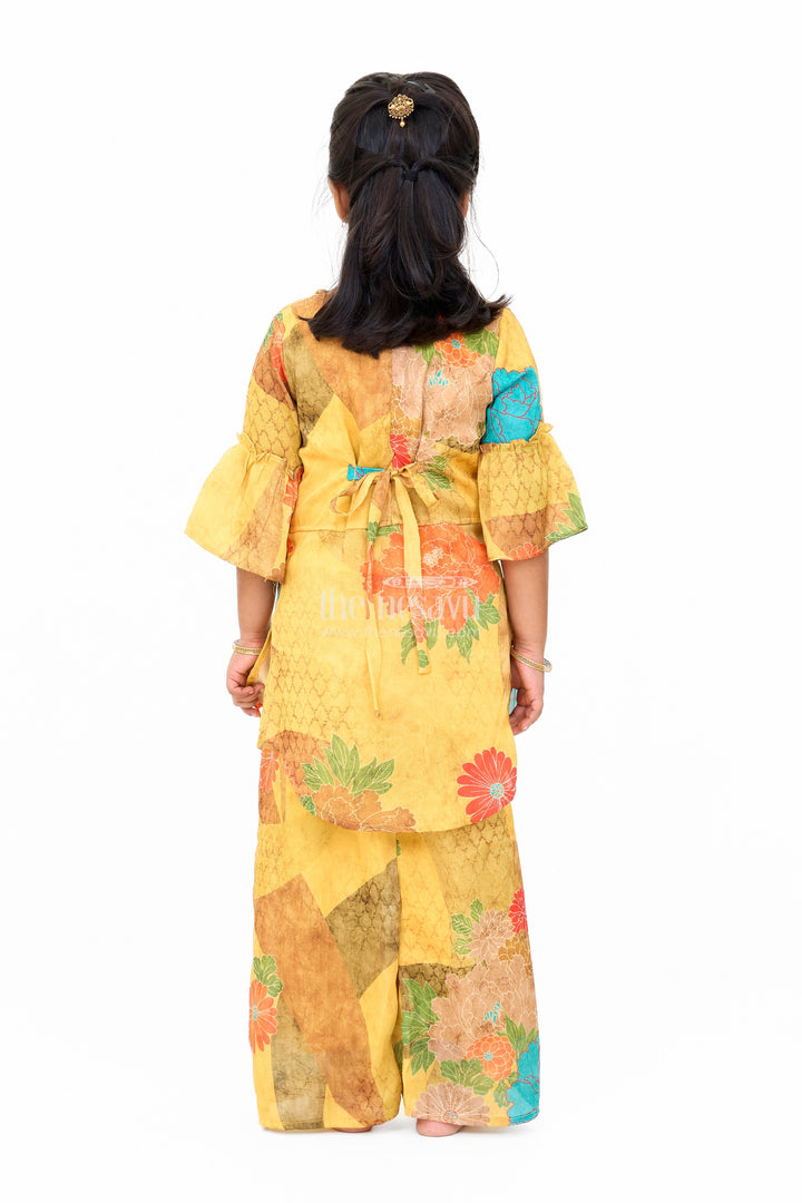 The Nesavu Girls Sharara / Plazo Set Mustard Mercerised Silk Cotton Girls Sharara Set with Bold Floral Print and Embellished Neckline Nesavu Nesavu Mustard Mercerised Silk Cotton Sharara Set Girls Floral Print Sequined Top