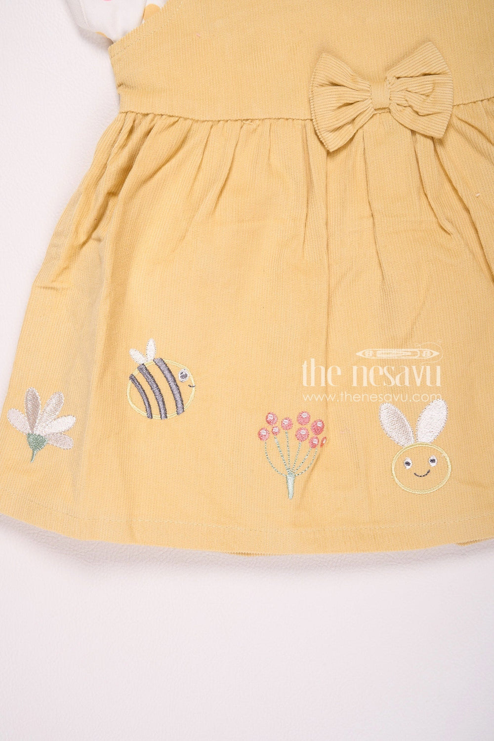 The Nesavu Baby Cotton Frocks Mustard Yellow Embroidered Baby Girl Frock with Polka Dot Inner T-Shirt Nesavu Mustard Yellow Embroidered Baby Girl Frock with Polka Dot Inner T-Shirt - Cute & Comfortable