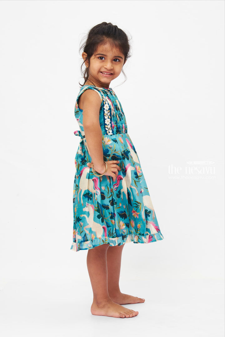 The Nesavu Girls Cotton Frock Mystical Mare Cotton Dress: Enchanted Equine Print Frock with Floral Lace Trim Nesavu Girls Enchanted Horse Print Dress | Teal Floral Lace Cotton Frock | Whimsical Ruffle Hem | The Nesavu