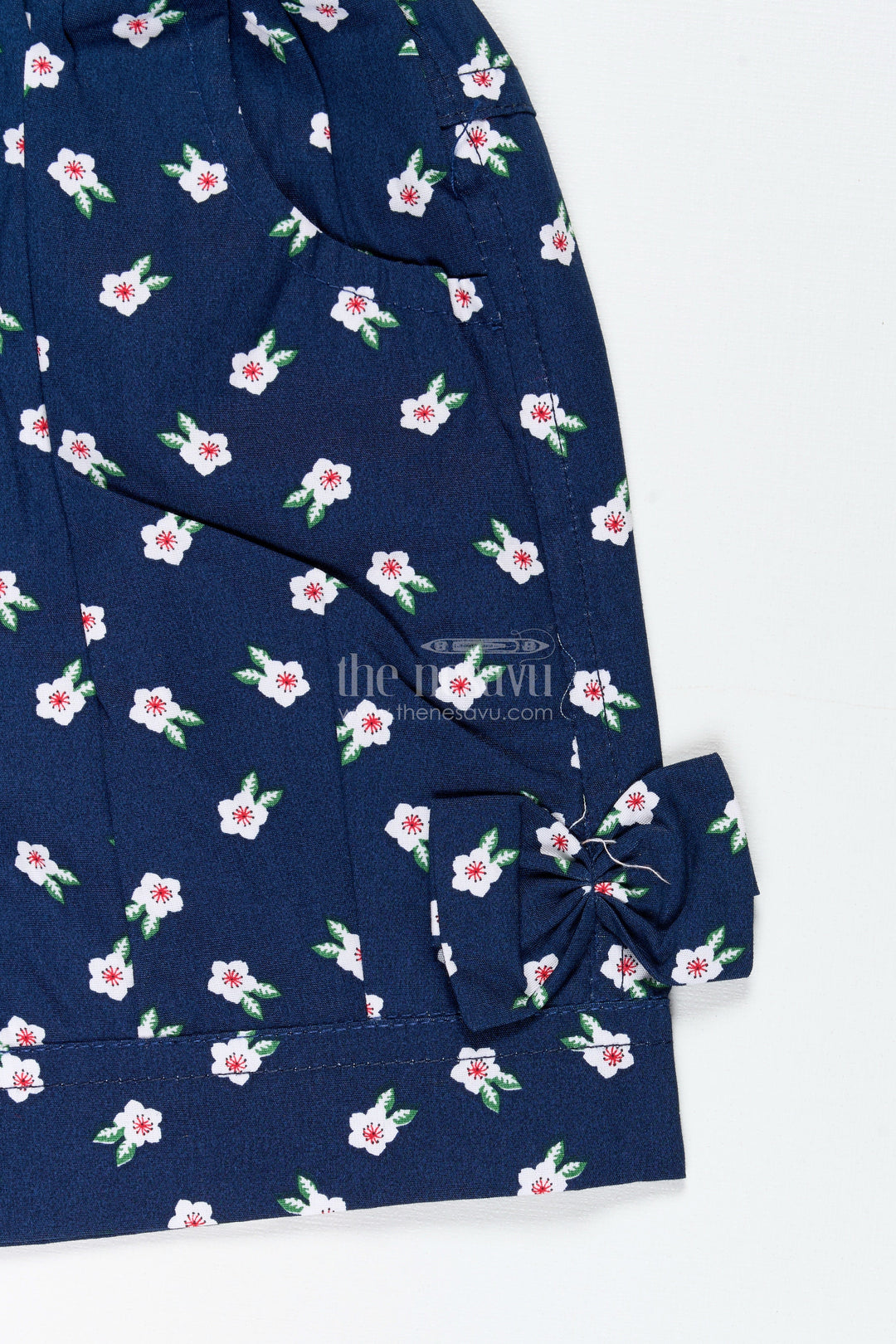 The Nesavu Girls Shorts Navy Cotton Shorts for Girls with Floral Print and Bows Nesavu Nesavu Navy Blue Cotton Floral Shorts Girls Elastic Fit Cute Side Bows