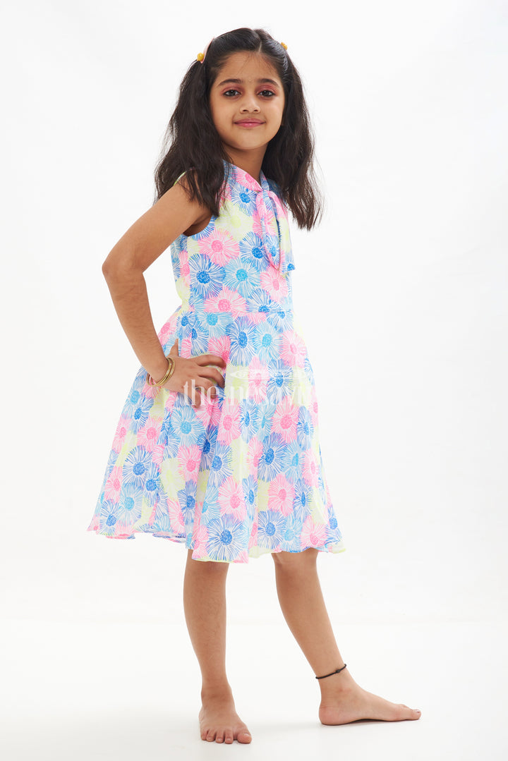 The Nesavu Girls Cotton Frock Neon Floral Sleeveless Frock for Girls in Blue and Yellow Nesavu Blue and Yellow Neon Floral Sleeveless Frock for Girls