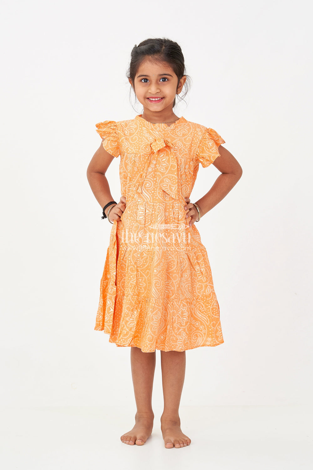 The Nesavu Girls Cotton Frock Nesavu Casual Cotton Frocks for Girls in Rayon with Orange Bandhani Print and Gold Foil Details Nesavu 18 (2Y) / Orange GFC1698B-18 Nesavu Casual Cotton Frocks Girls Rayon Orange Bandhani Print Gold Foil Details