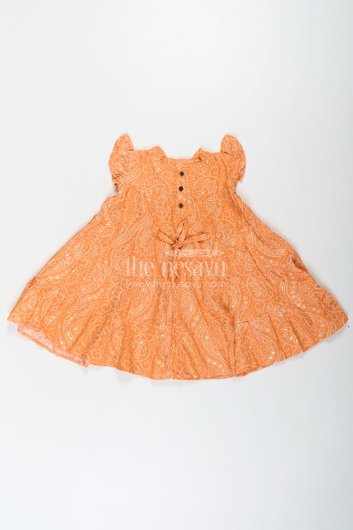 The Nesavu Girls Cotton Frock Nesavu Casual Cotton Frocks for Girls in Rayon with Orange Bandhani Print and Gold Foil Details Nesavu Casual Cotton Frocks Girls Rayon Orange Bandhani Print Gold Foil Details | The Nesavu
