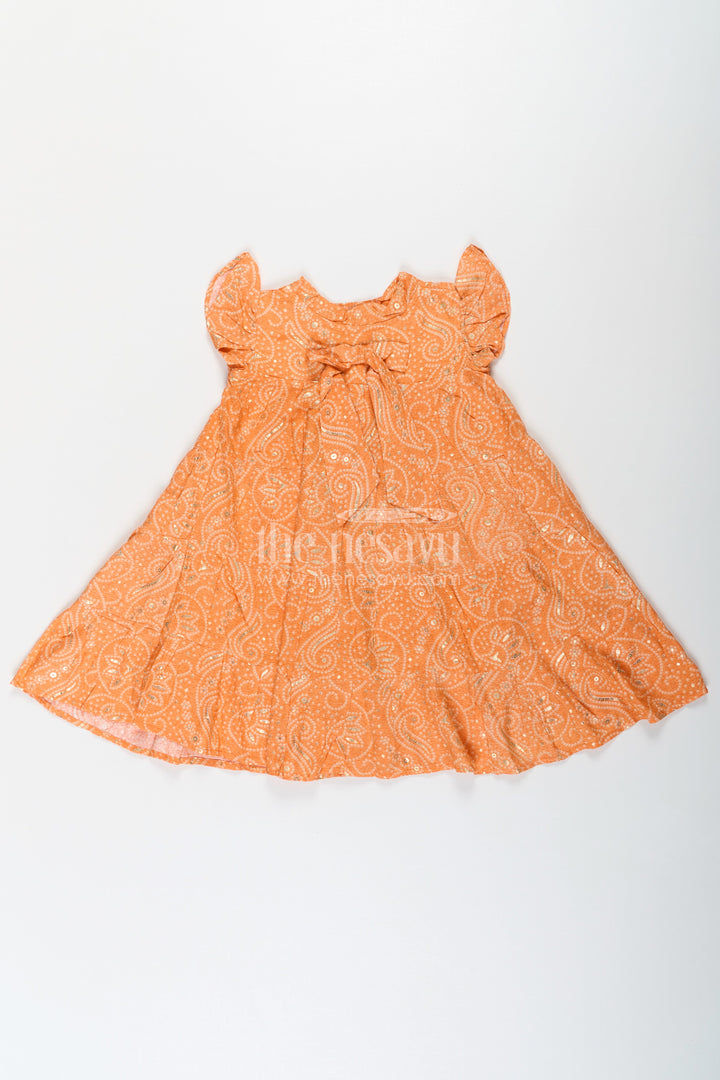 The Nesavu Girls Cotton Frock Nesavu Casual Cotton Frocks for Girls in Rayon with Orange Bandhani Print and Gold Foil Details Nesavu Casual Cotton Frocks Girls Rayon Orange Bandhani Print Gold Foil Details | The Nesavu