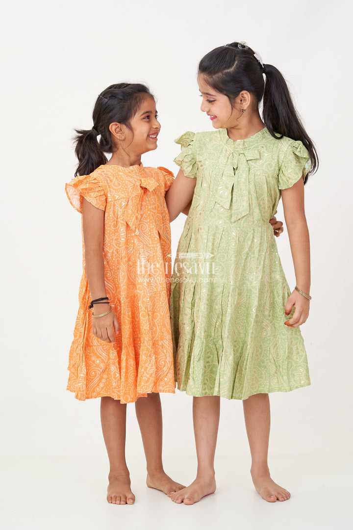 The Nesavu Girls Cotton Frock Nesavu Casual Cotton Frocks for Girls in Rayon with Orange Bandhani Print and Gold Foil Details Nesavu Casual Cotton Frocks Girls Rayon Orange Bandhani Print Gold Foil Details | The Nesavu