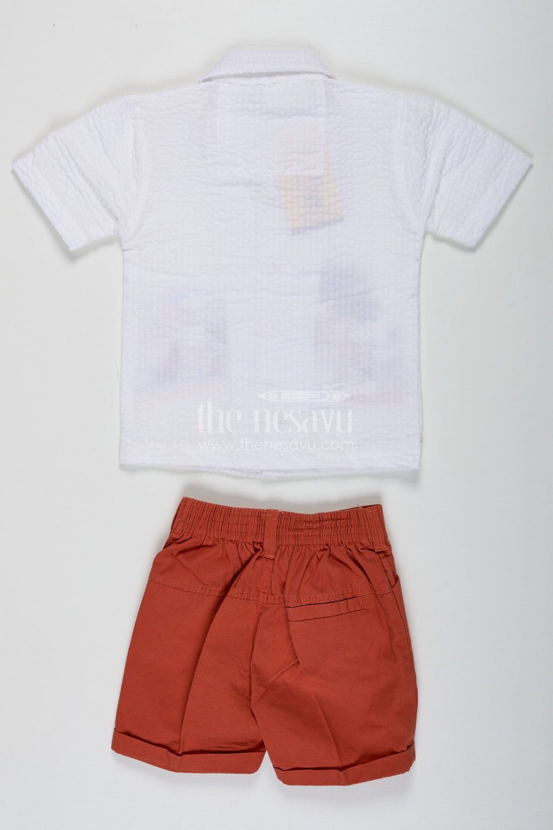The Nesavu Boys Casual Set Orange Traditional Dress Set for Boys in Crush Cotton with Seaside Embroidery and Burnt Orange Shorts Nesavu Orange Traditional Dress Set for Boys with Coastal Embroidery Shirt and Crush Cotton Burnt Orange Shorts | The Nesavu
