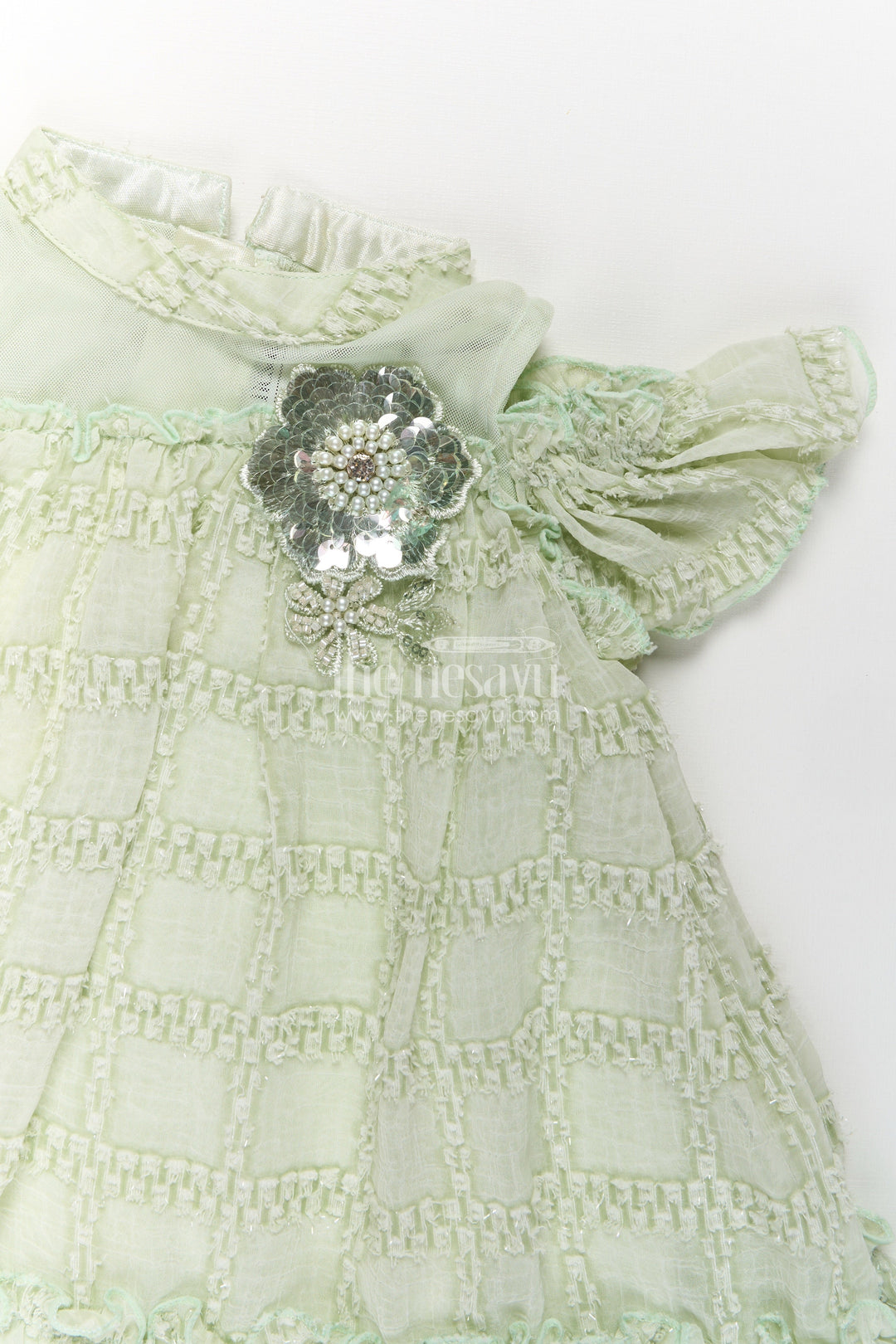 The Nesavu Girls Fancy Frock Organza Dress Frock for Girls in Light Green with Ruffle Hem and Floral Brooch Detail Nesavu Organza Dress Frock Girls Light Green Ruffles Embellished Floral Brooch | The Nesavu