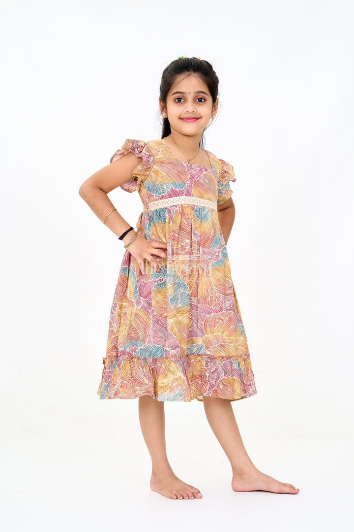 The Nesavu Girls Cotton Frock Organza Frock for Girls in Multicolor Leaf Pattern with Flared Design Nesavu Multicolor Leaf Pattern Organza Frock Girls Ruffle Hem | The Nesavu