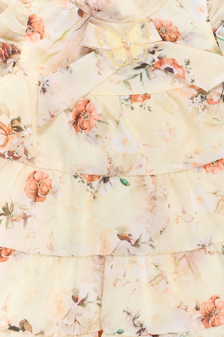 The Nesavu Girls Fancy Frock Party Frocks for Kids in Yellow with Vibrant Floral Prints and Layered Skirt Nesavu Party Frocks Kids Yellow Floral Prints Ruffled Sleeves Layered Skirt | The Nesavu