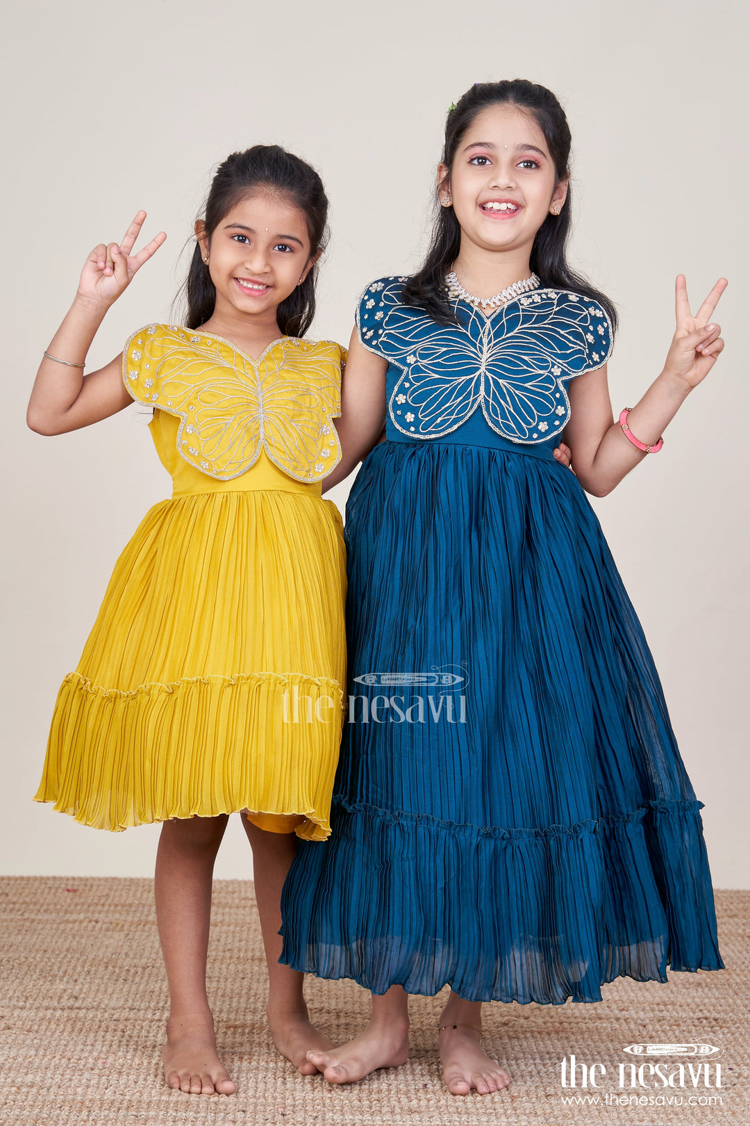 The Nesavu Girls Party Gown Party Gown for Girls with Butterfly Embellishment and Pleated Skirt Nesavu Nesavu pleated party gown girls butterfly detail perfect birthdays celebrations