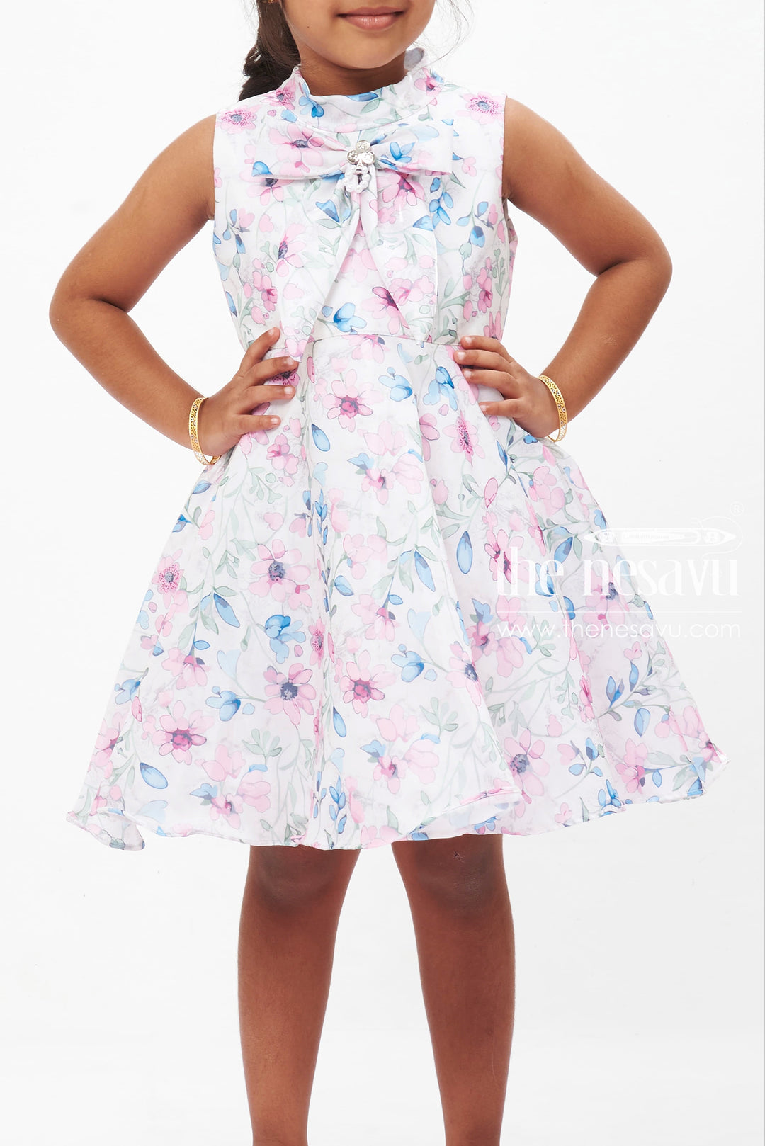 The Nesavu Girls Fancy Frock Pastel Petal Parade: Girls' Cream Sleeveless Floral Dress with Jewel Accent Nesavu Casual Floral Dress for Girls | Sleeveless Cream Floral Frock | Kids Garden Party Wear | The Nesavu