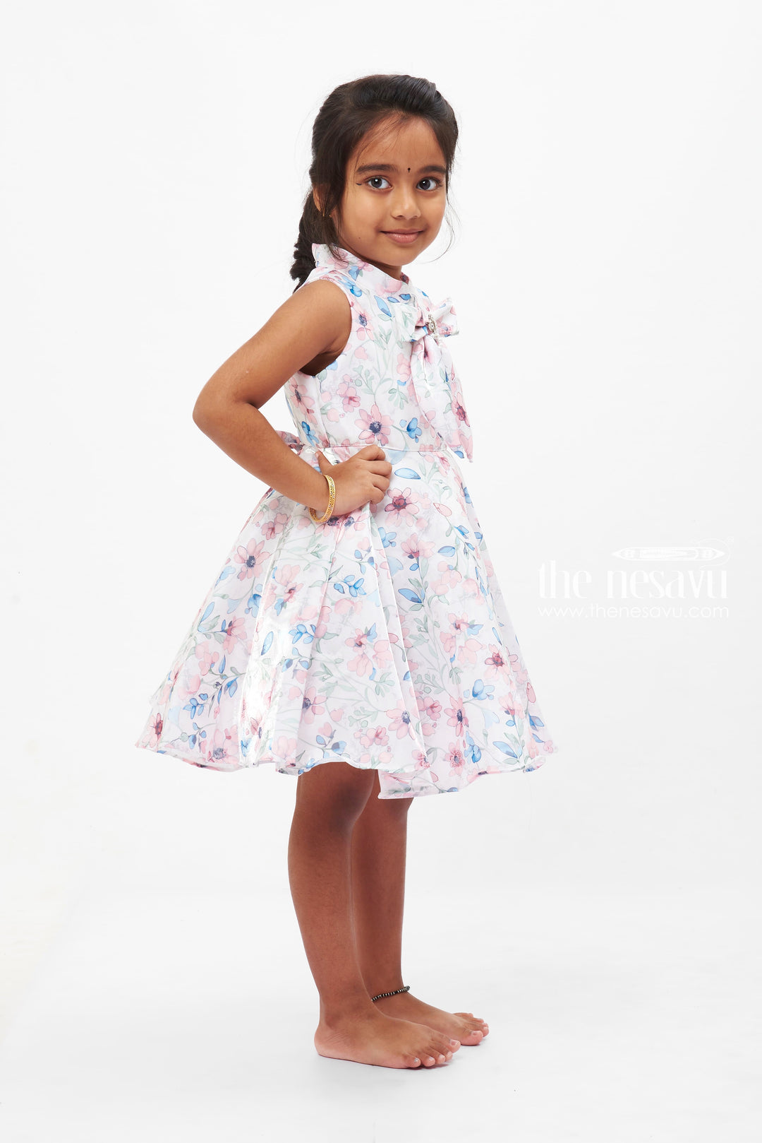 The Nesavu Girls Fancy Frock Pastel Petal Parade: Girls' Cream Sleeveless Floral Dress with Jewel Accent Nesavu Casual Floral Dress for Girls | Sleeveless Cream Floral Frock | Kids Garden Party Wear | The Nesavu