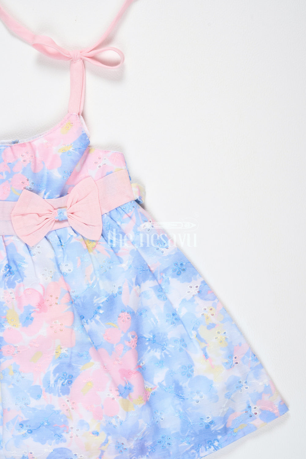 The Nesavu Tie-up Frock Peach and Blue Floral Shiffley TieUp Frock with Bow Accent for Baby Girls Nesavu Peach and Blue Floral Shiffley Tie-Up Frock with Bow Accent for Baby Girls Nesavu