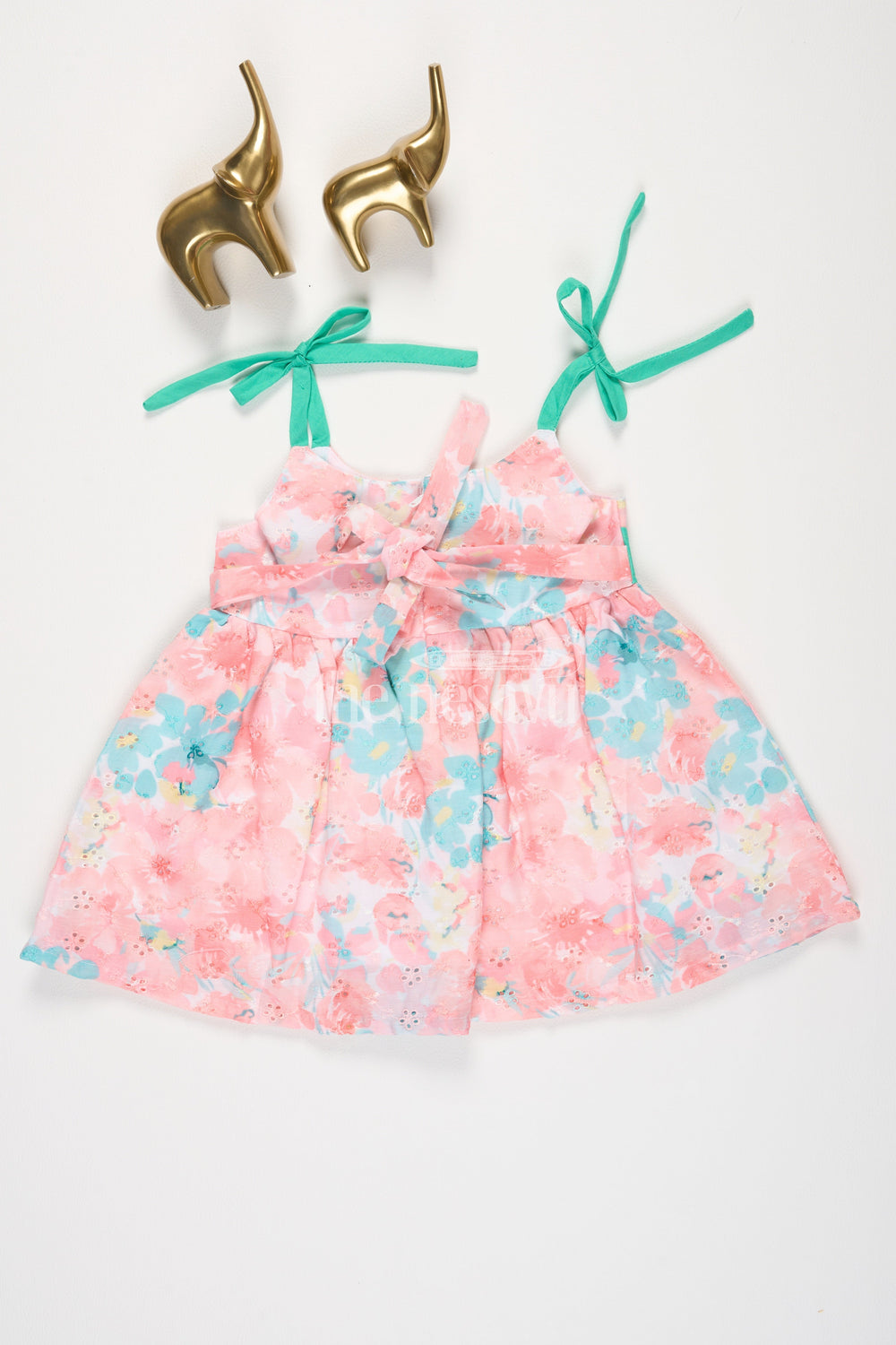 The Nesavu Tie-up Frock Peach and Cyan Floral Digital Printed TieUp Frock for Girls with Bow Detail Nesavu Peach and Cyan Floral Digital Printed Tie-Up Frock with Bow Detail for Girls Nesavu