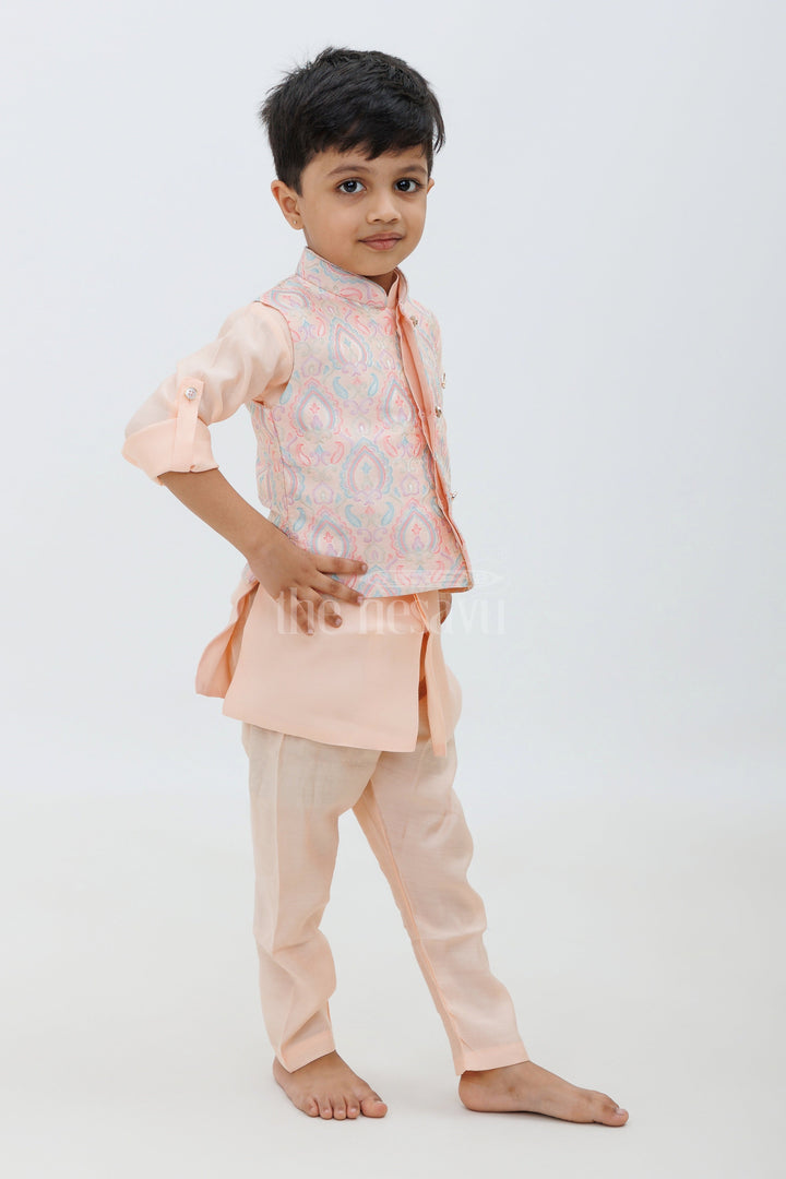 The Nesavu Boys Dothi Set Peach Color Designer Dhoti Kurta Set for Boys with Embroidered Jacket and Panchakacham Pants Nesavu Peach Color Designer Dhoti Kurta Set for Boys with Embroidered Jacket Nesavu