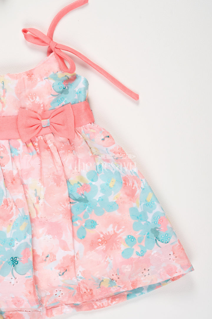 The Nesavu Tie-up Frock Peach Floral Digital Printed TieUp Frock with Bow Detail for Girls Nesavu Peach Floral Digital Printed Tie-Up Frock with Bow Detail for Girls Nesavu