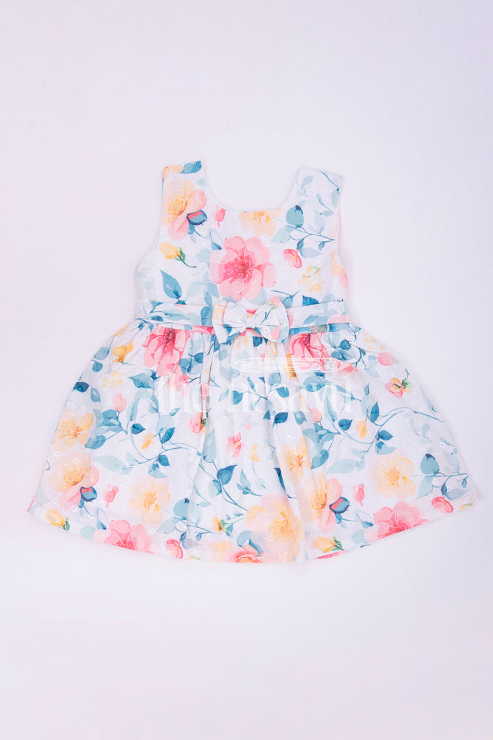 The Nesavu Girls Cotton Frock Peach Floral Sleeveless Baby Frock Nesavu Peach Floral Sleeveless Baby Frock with Bow Detail