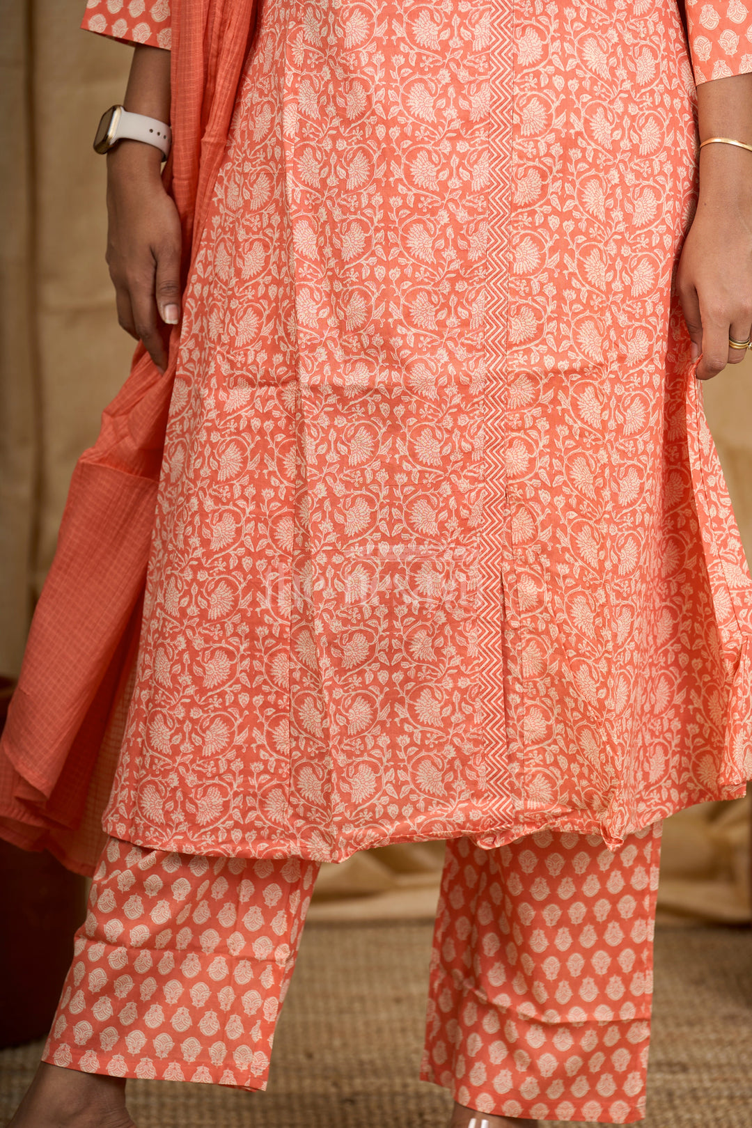 The Nesavu Womens Flared Suit Sets Peach Jaipuri Block Printed Cotton Flared Suit Set with Tassel Detailing on Neckline for Women Nesavu Nesavu Peach Jaipuri Block Printed Cotton Flared Suit Set Tassel Detailing Women