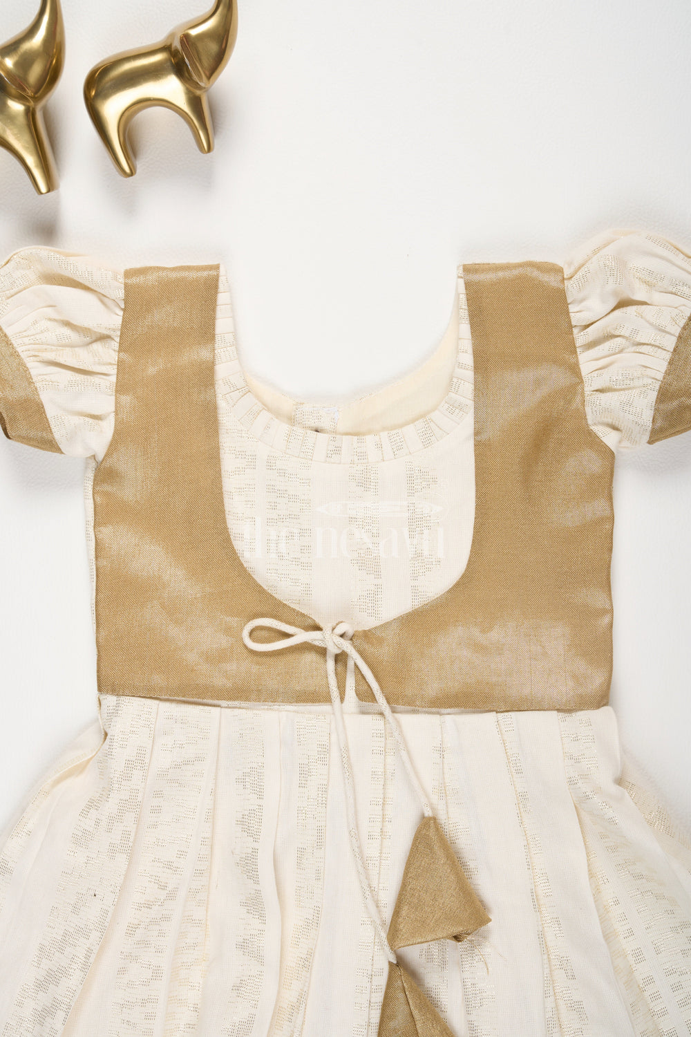 The Nesavu Girls Cotton Frock Pew Cotton Cream Frock with Gold Tissue Jacket and UShaped Neckline for Girls Nesavu Pew Cotton Cream Frock with Gold Tissue Jacket and U-Shaped Neckline for Girls Nesavu