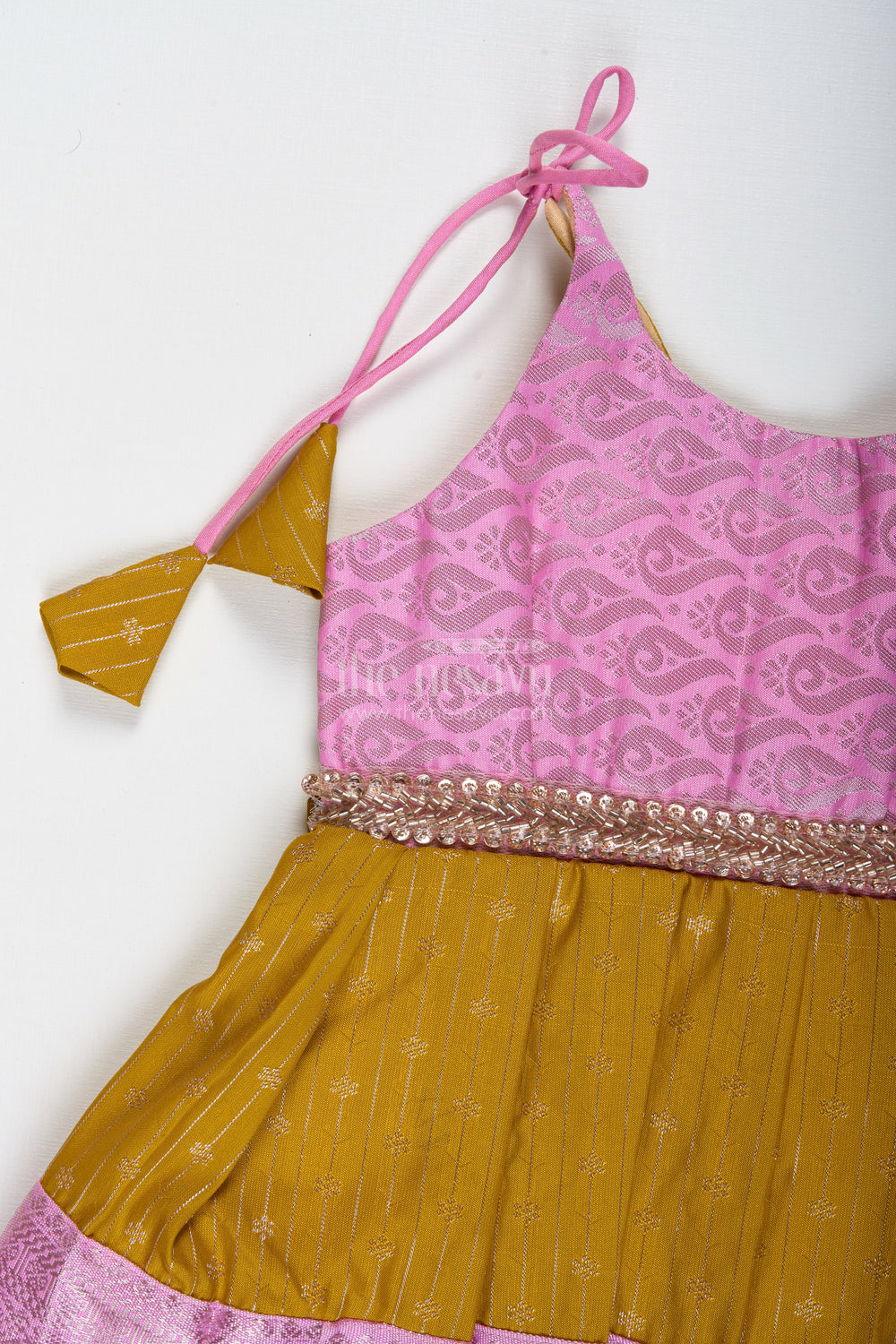 The Nesavu Tie-up Frock Pink and Mustard Frock for Baby Girls in Semi Silk Ideal for Birthdays and Traditional Gatherings Nesavu Nesavu Pink And Mustard Frock For Baby Girls Semi Silk Ethnic Dress For Birthdays And Poojas