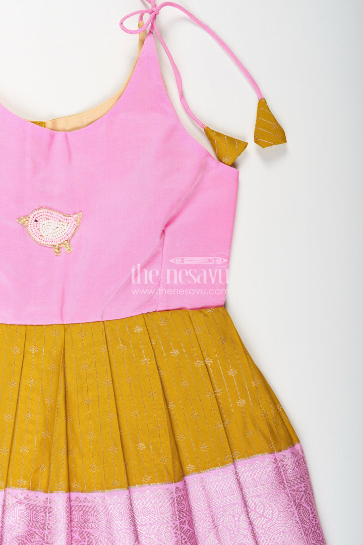 The Nesavu Tie-up Frock Pink and Mustard Frock for Baby Girls in Semi Silk Ideal for Birthdays and Traditional Gatherings Nesavu Nesavu Pink And Mustard Frock For Baby Girls Semi Silk Ethnic Dress For Birthdays And Poojas