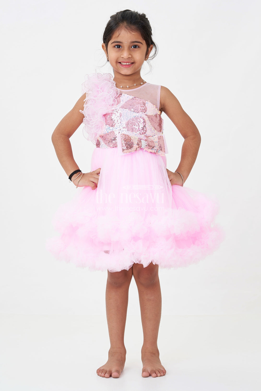 The Nesavu Girls Fancy Party Frock Pink Birthday Dress for Girls in Net with Ruffle Layers and Sequinned Yoke and Bow Nesavu Pink Birthday Dress Girls Net Sequin Yoke Layered Ruffle Skirt | The Nesavu