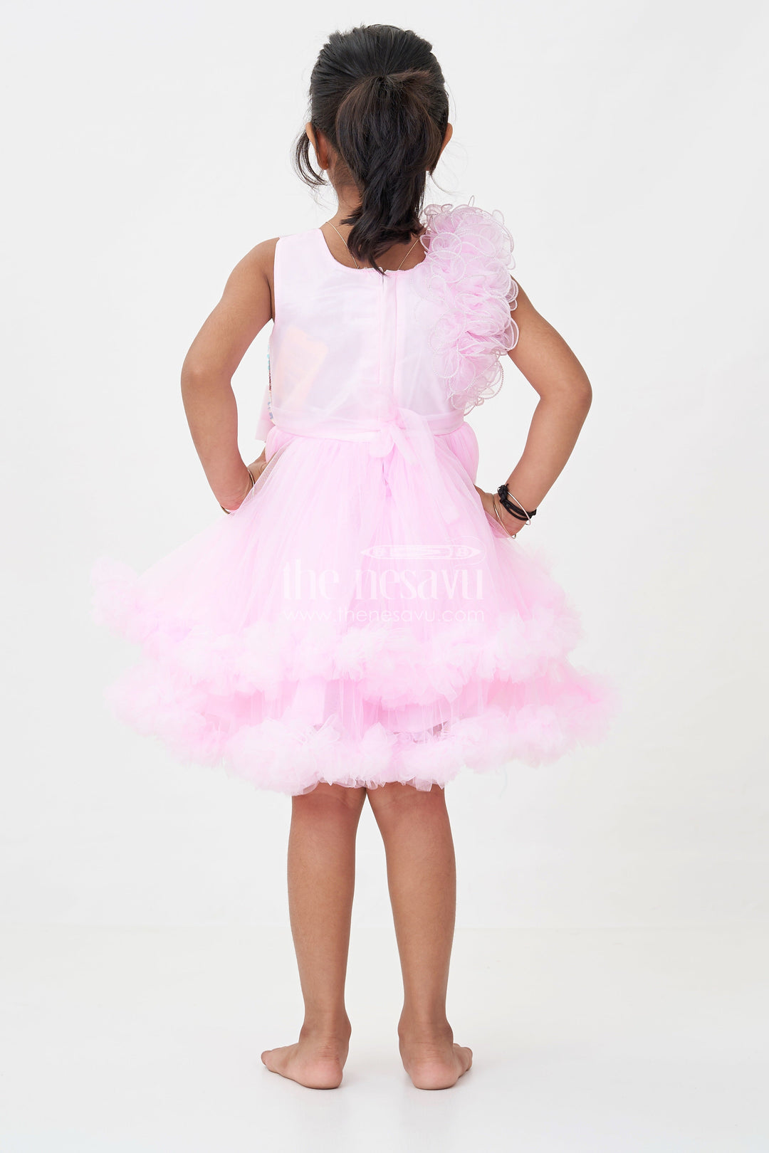 The Nesavu Girls Fancy Party Frock Pink Birthday Dress for Girls in Net with Ruffle Layers and Sequinned Yoke and Bow Nesavu Pink Birthday Dress Girls Net Sequin Yoke Layered Ruffle Skirt | The Nesavu