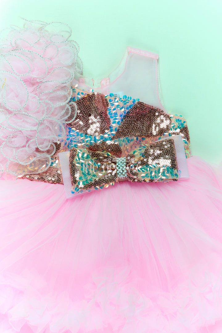 The Nesavu Girls Fancy Party Frock Pink Birthday Dress for Girls in Net with Ruffle Layers and Sequinned Yoke and Bow Nesavu Pink Birthday Dress Girls Net Sequin Yoke Layered Ruffle Skirt | The Nesavu