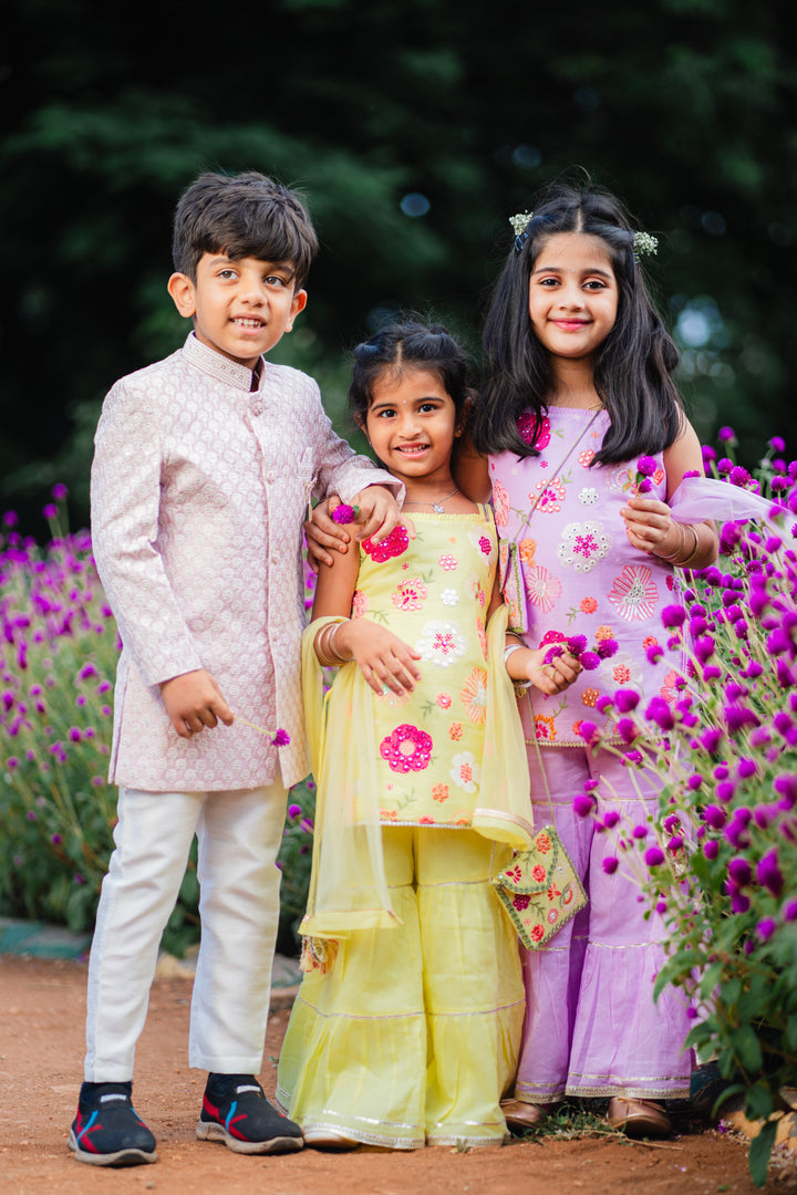 The Nesavu Boys Sherwani Pink Blended Silk Boys Sherwani Set with Cream Pants Nesavu Pink Boys Sherwani Set Jacquard Kurta Cream Silk Pants Special Occasions