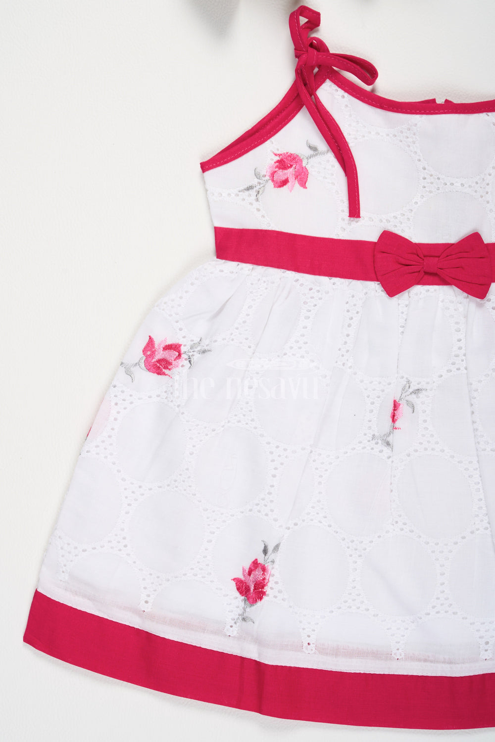 The Nesavu Tie-up Frock Pink Chikankari Embroidered TieUp Frock with Floral Motifs for Girls Nesavu Pink Chikankari Embroidered Tie-Up Frock with Floral Motifs for Girls Nesavu