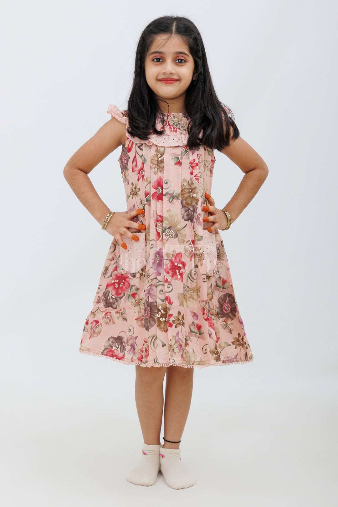 The Nesavu Girls Fancy Frock Pink Floral Cotton Frock with Smocked Neckline and Pockets Nesavu Pink Floral Cotton Frock with Smocked Neckline - Nesavu