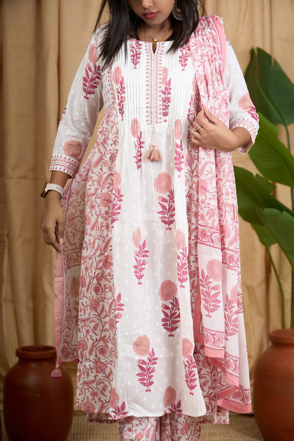 The Nesavu Womens Flared Suit Sets Pink Jaipuri Cotton Kurti Set with Elegant Pleated Tassel Detailing and Coordinated Floral Bottom for Women Nesavu Nesavu Pink Jaipuri Cotton Kurti Set Pleated Tassels Floral Printed Bottom Women