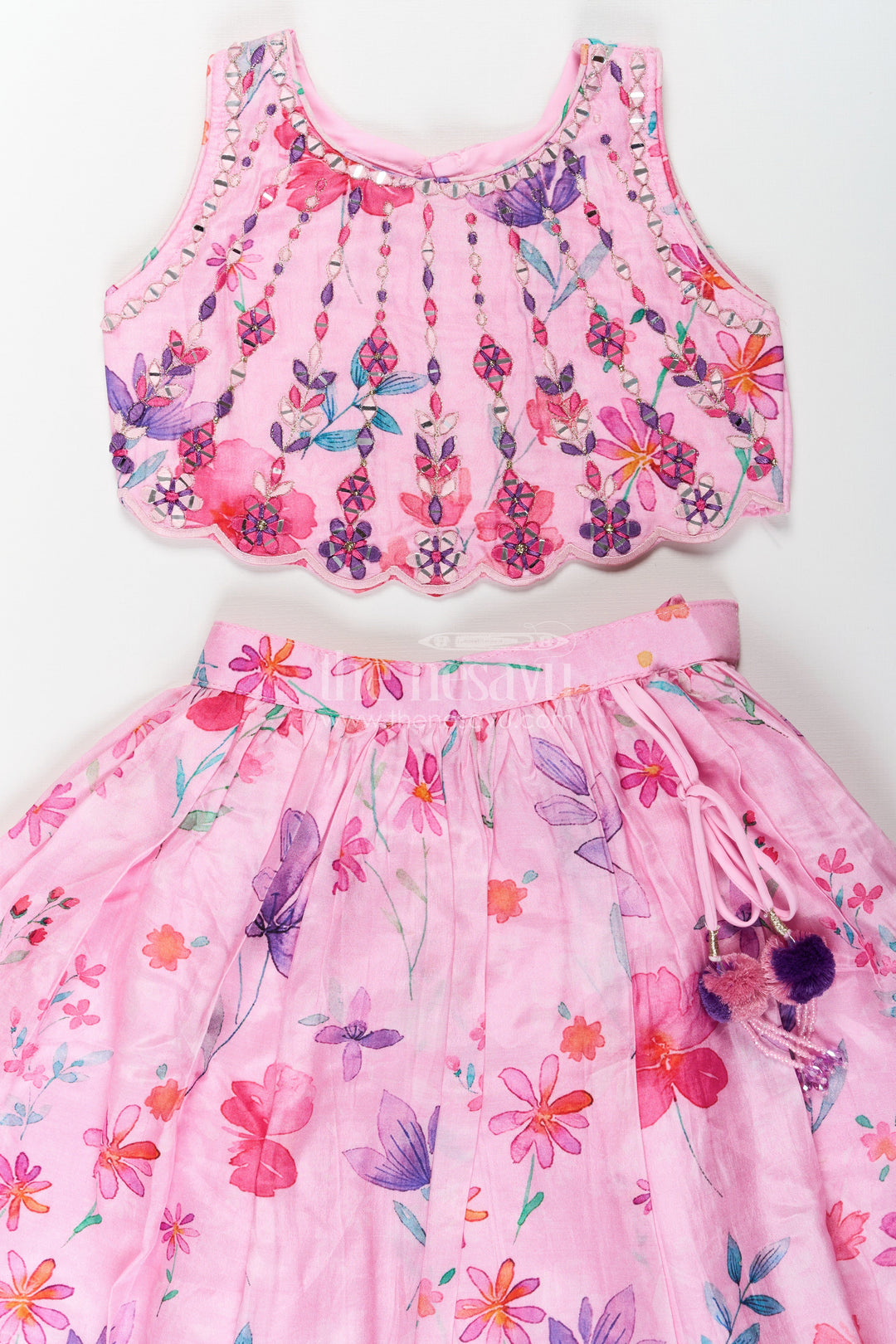 The Nesavu Girls Lehenga Choli Pink Party Wear Lehenga Choli for Girls in Viscose Silk with Mirror Embroidered Yoke and Floral Printed Skirt Nesavu Pink Party Wear Girls Lehenga Choli with Floral Print and Mirror Embroidered Viscose Silk Top | The Nesavu